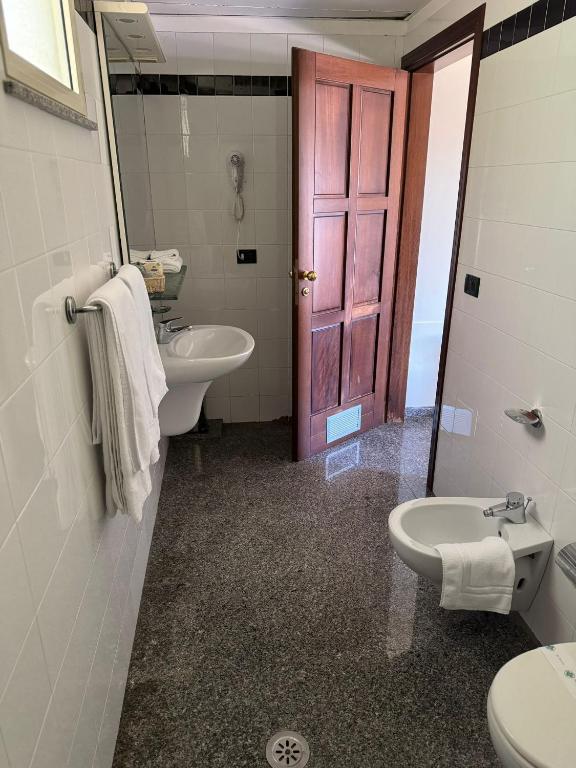Koupelna v ubytování Hotel Arcobaleno