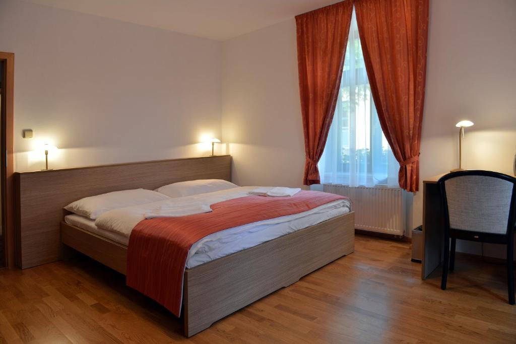 Postel nebo postele na pokoji v ubytování Resort Johanka