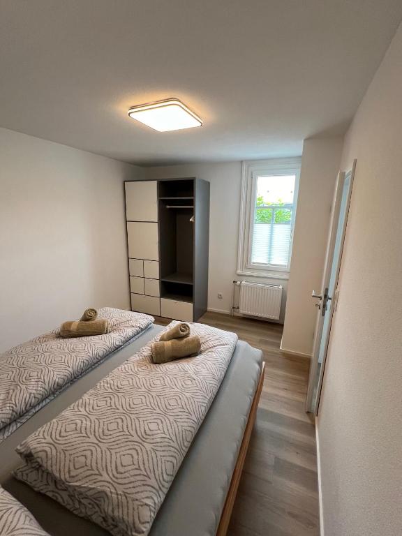 Postel nebo postele na pokoji v ubytování Rohrspitz Ferienwohnung