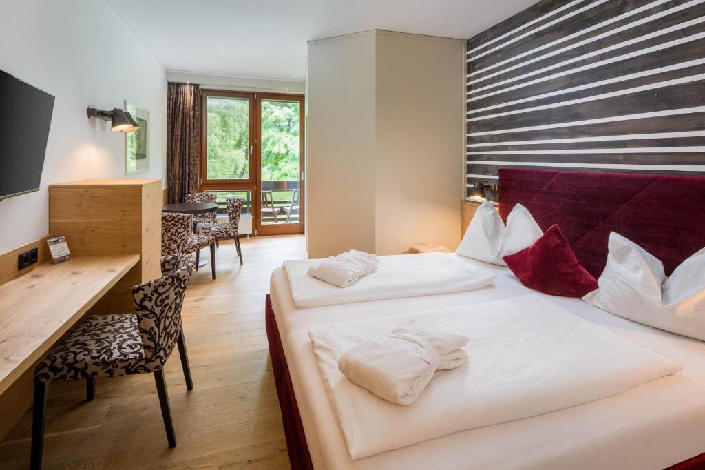 Posteľ alebo postele v izbe v ubytovaní Hotel NockResort