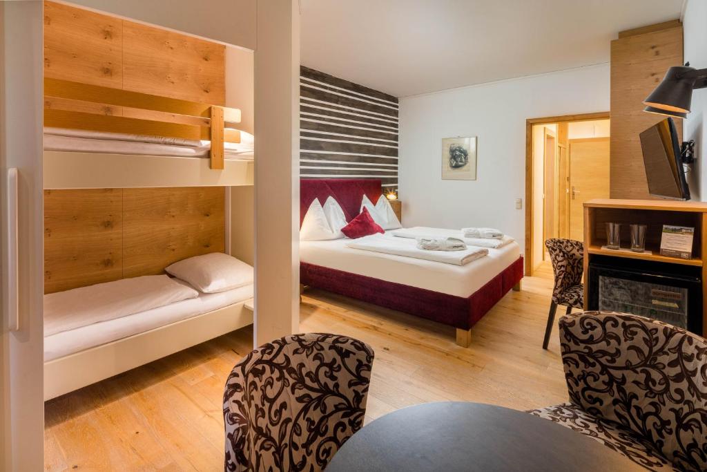 Posteľ alebo postele v izbe v ubytovaní Hotel NockResort
