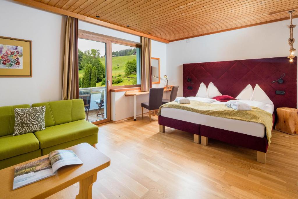 Posteľ alebo postele v izbe v ubytovaní Hotel NockResort