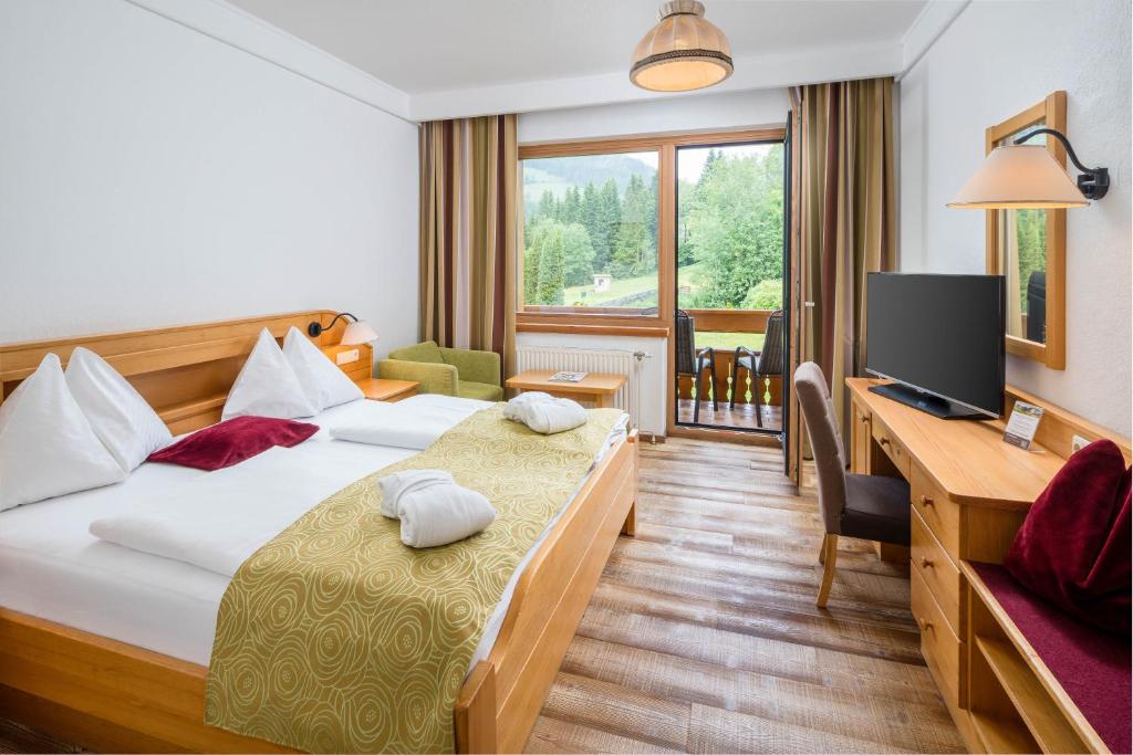 Posteľ alebo postele v izbe v ubytovaní Hotel NockResort