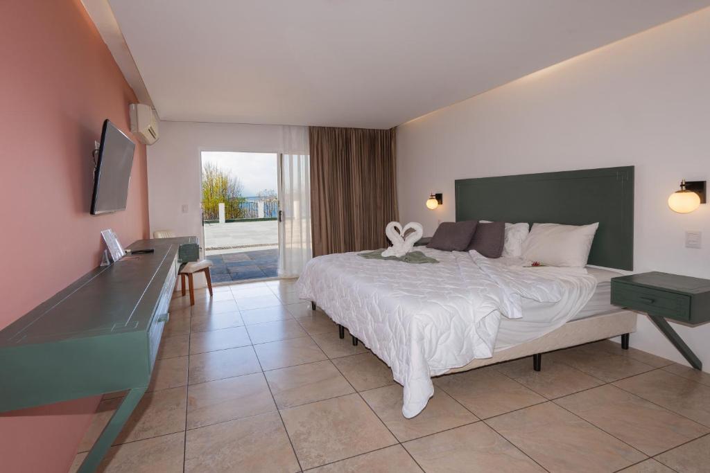 Postel nebo postele na pokoji v ubytování Dunama Hotel