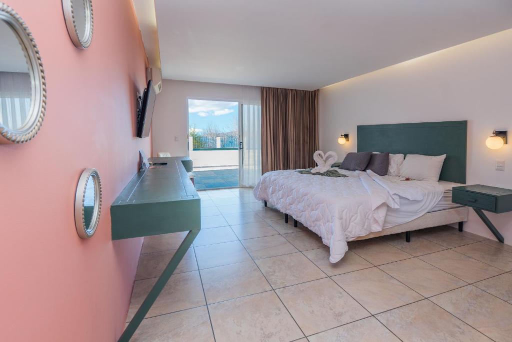 Postel nebo postele na pokoji v ubytování Dunama Hotel