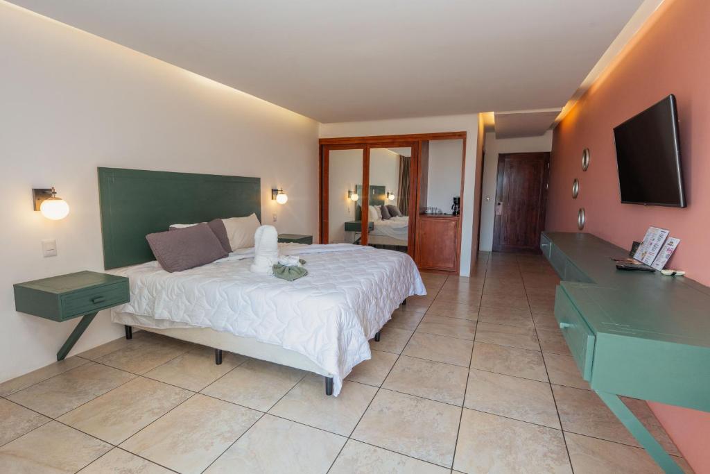 Postel nebo postele na pokoji v ubytování Dunama Hotel