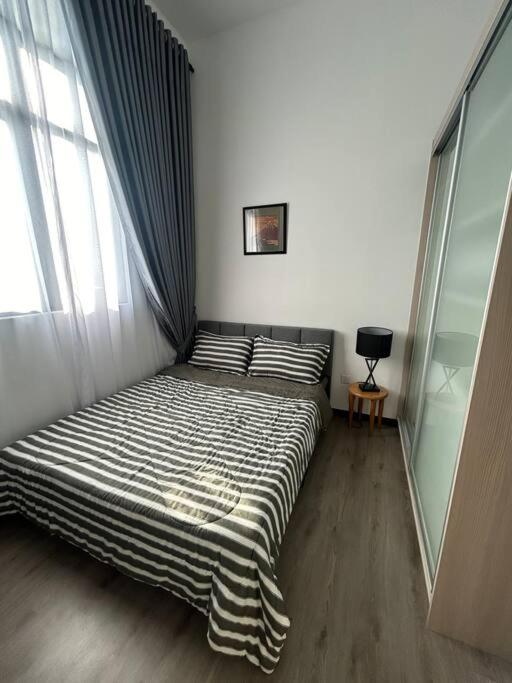Postel nebo postele na pokoji v ubytování F Homestay Putrajaya Near to PICC