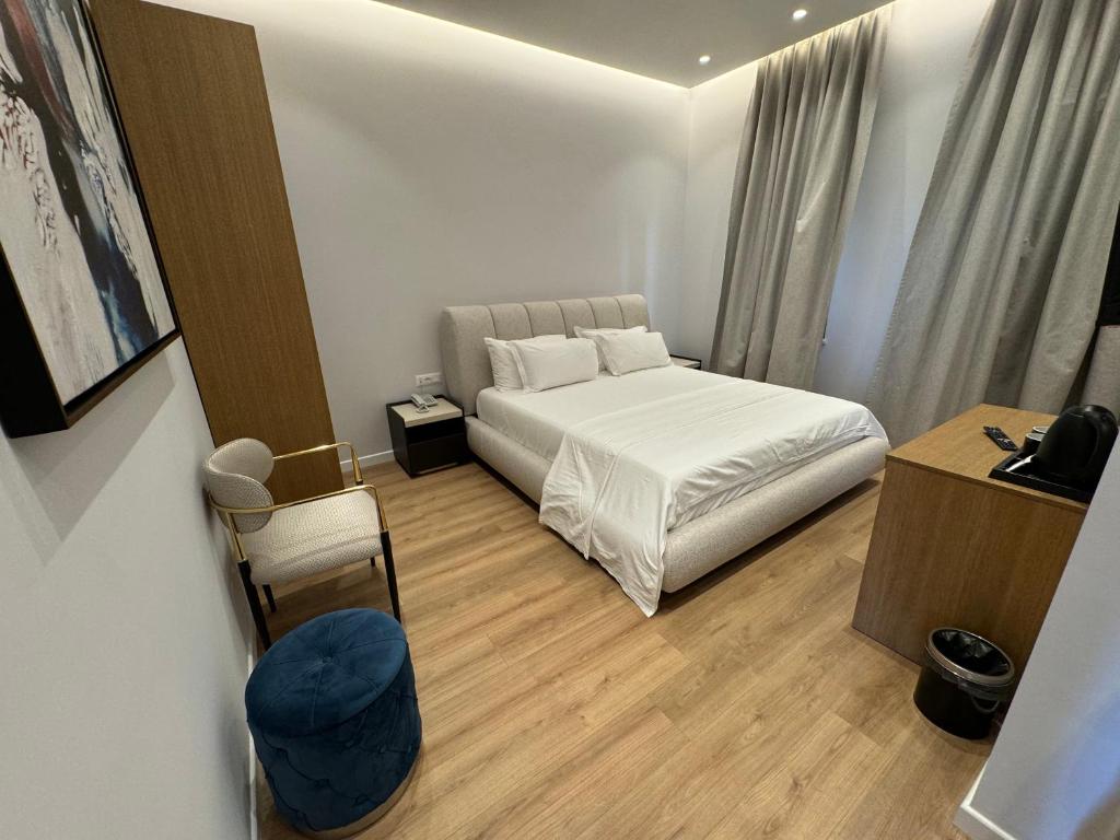 Postel nebo postele na pokoji v ubytování Hotel Vila Zeus