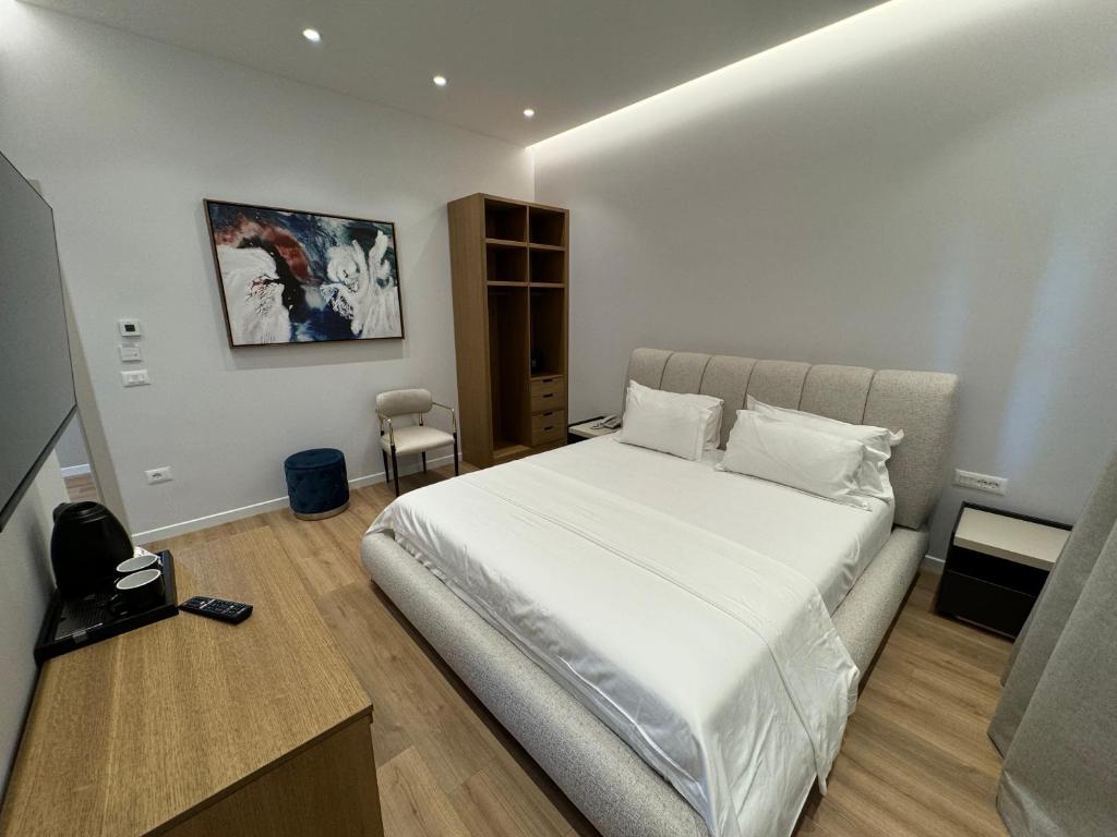 Postel nebo postele na pokoji v ubytování Hotel Vila Zeus