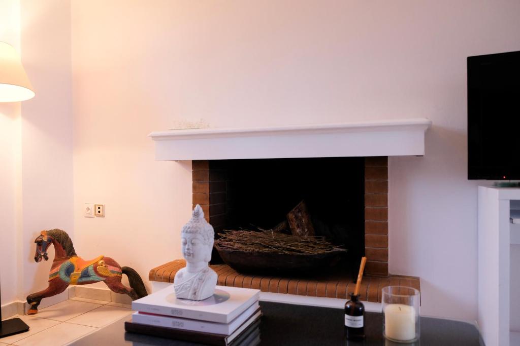 TV a/nebo společenská místnost v ubytování Spacious holiday house with seaview and garden