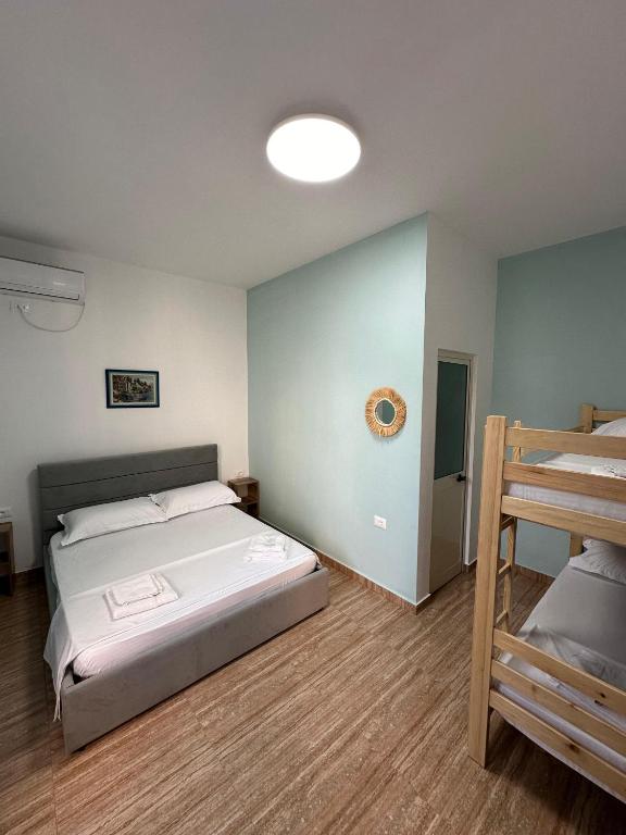 Postel nebo postele na pokoji v ubytování Las Palmas Guesthouse