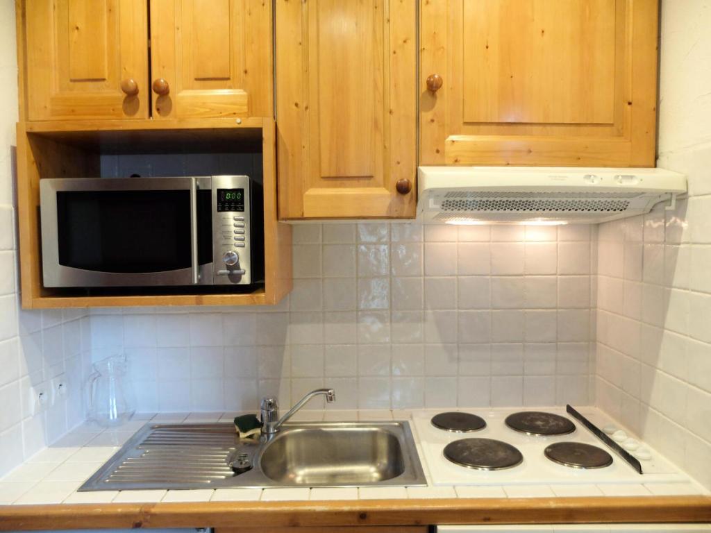 Kuchyňa alebo kuchynka v ubytovaní Résidence Savoy - Appartement confortable·Ski aux pieds MAE-4994