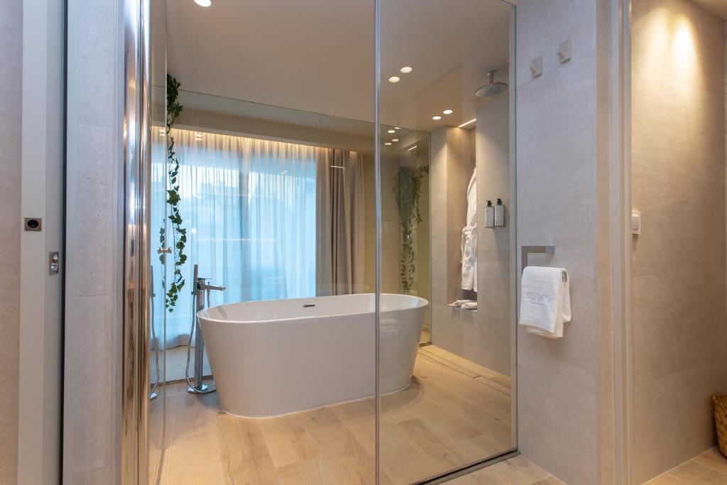 Koupelna v ubytování XULOS Rooms & Suites