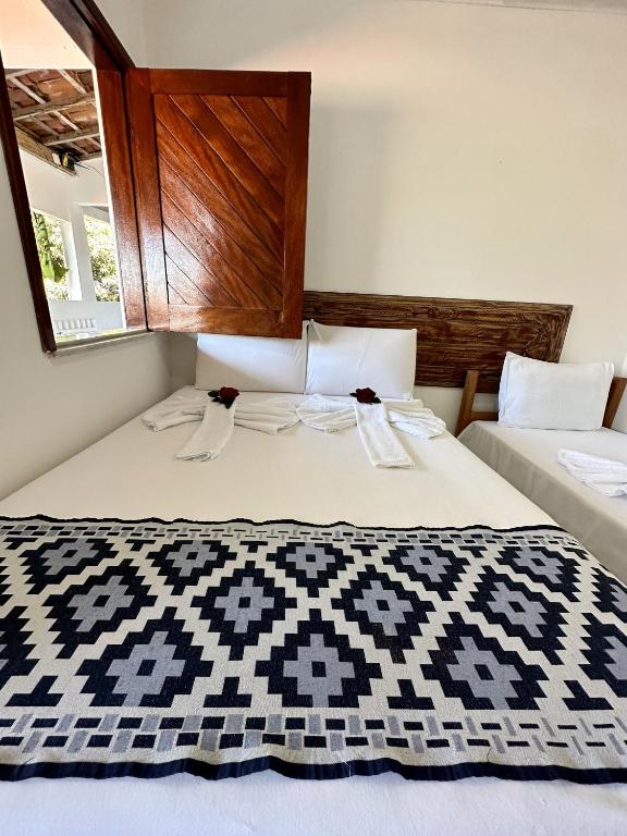 Postel nebo postele na pokoji v ubytování Mar à Vista Ilha de Boipeba