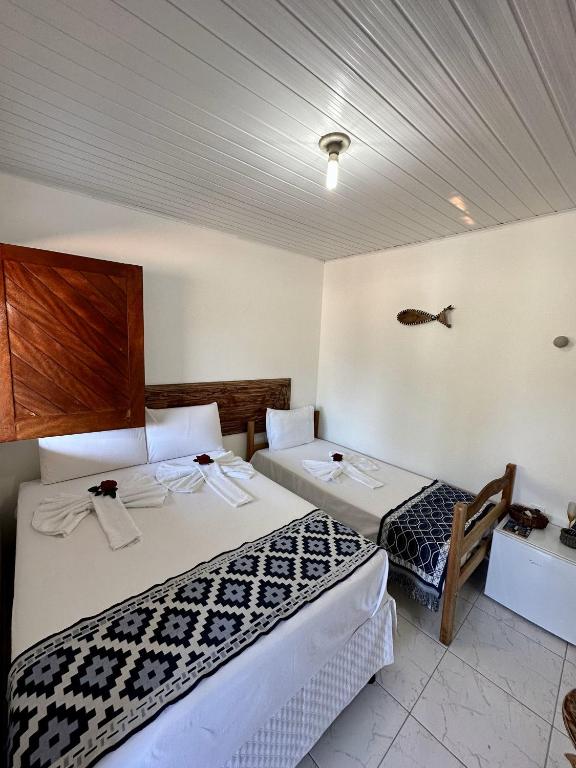 Postel nebo postele na pokoji v ubytování Mar à Vista Ilha de Boipeba