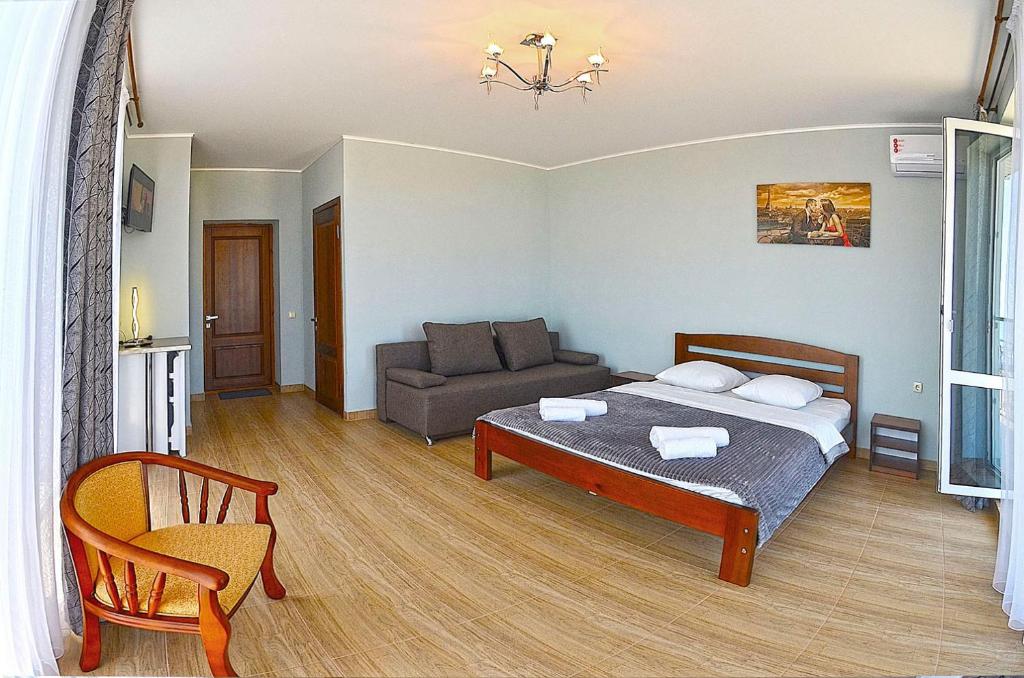 Postel nebo postele na pokoji v ubytování Hotel Golden Beach