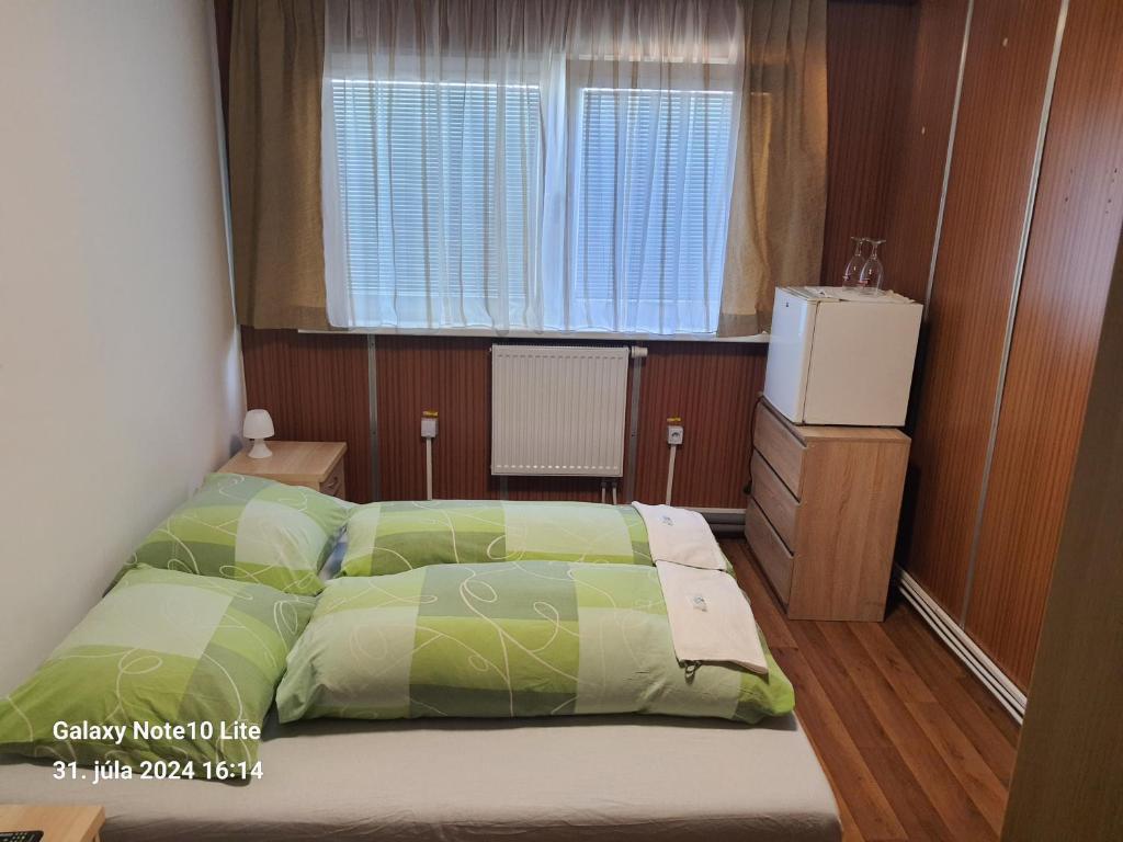 Postel nebo postele na pokoji v ubytování Motorest u Janíčkov