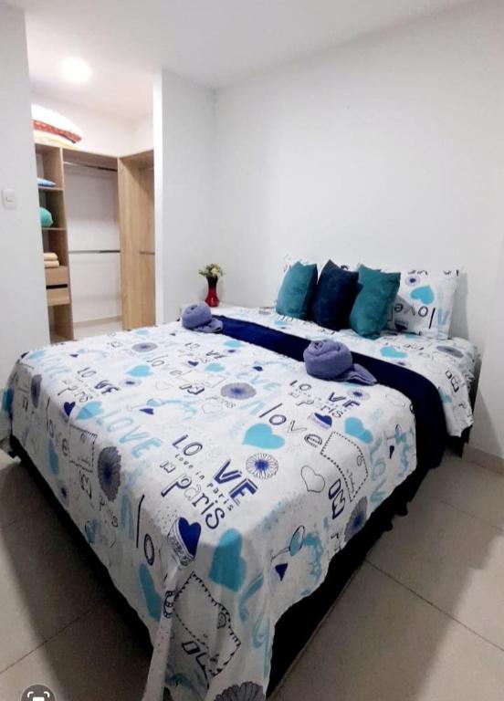 Postel nebo postele na pokoji v ubytování Acogedor y Agradable Apartaestudio en Campus 67