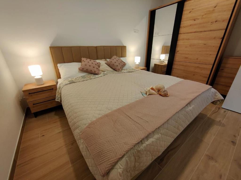 Postel nebo postele na pokoji v ubytování Villa Lea Marezige Koper