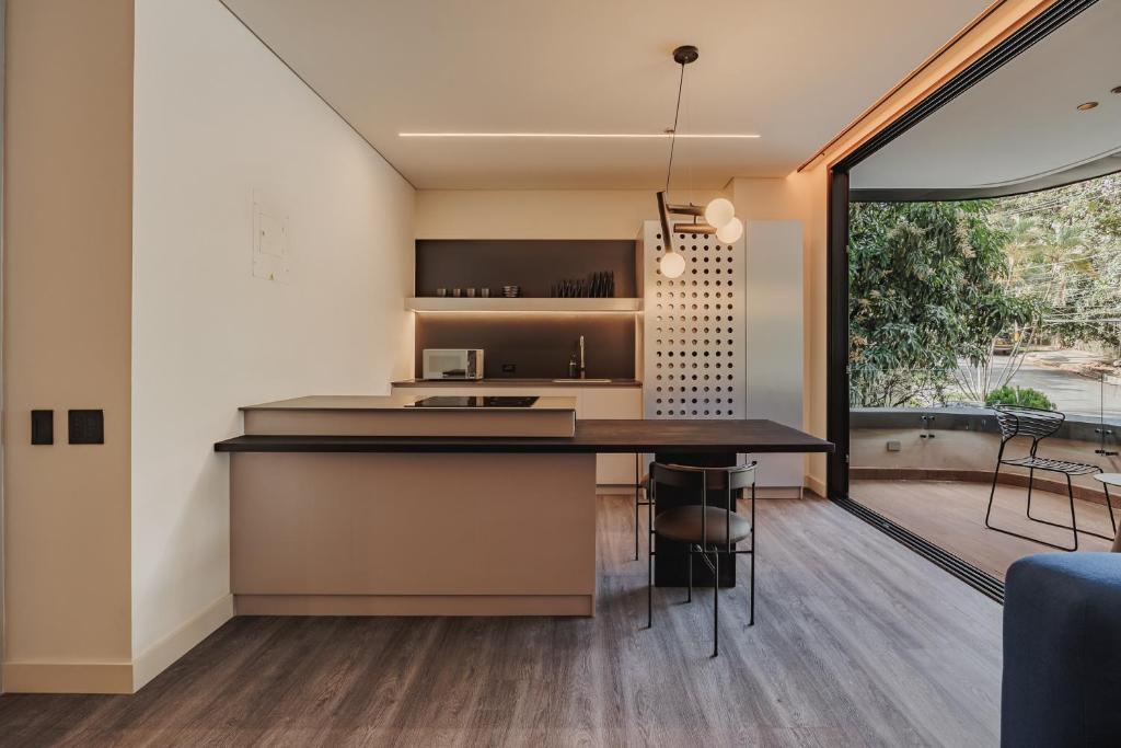 Kuchyň nebo kuchyňský kout v ubytování Nock - Reserved Residences