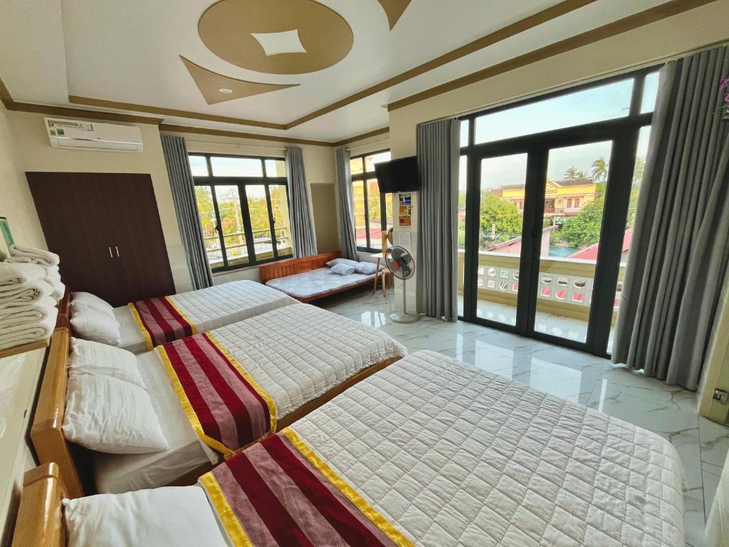 Giường trong phòng chung tại T'H Homestay