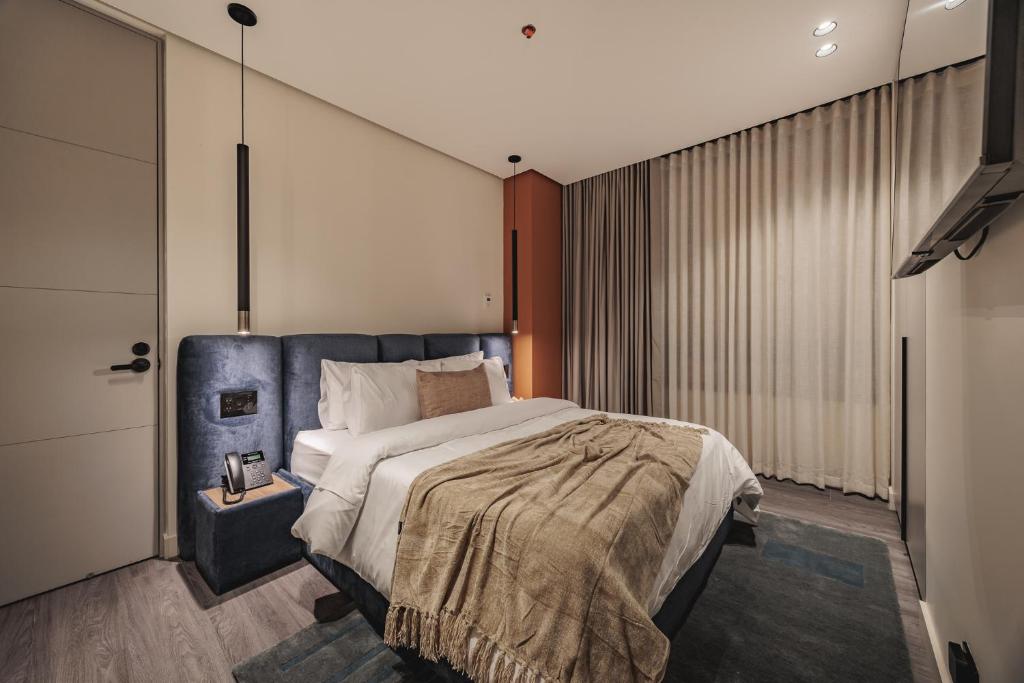 Postel nebo postele na pokoji v ubytování Nock - Reserved Residences