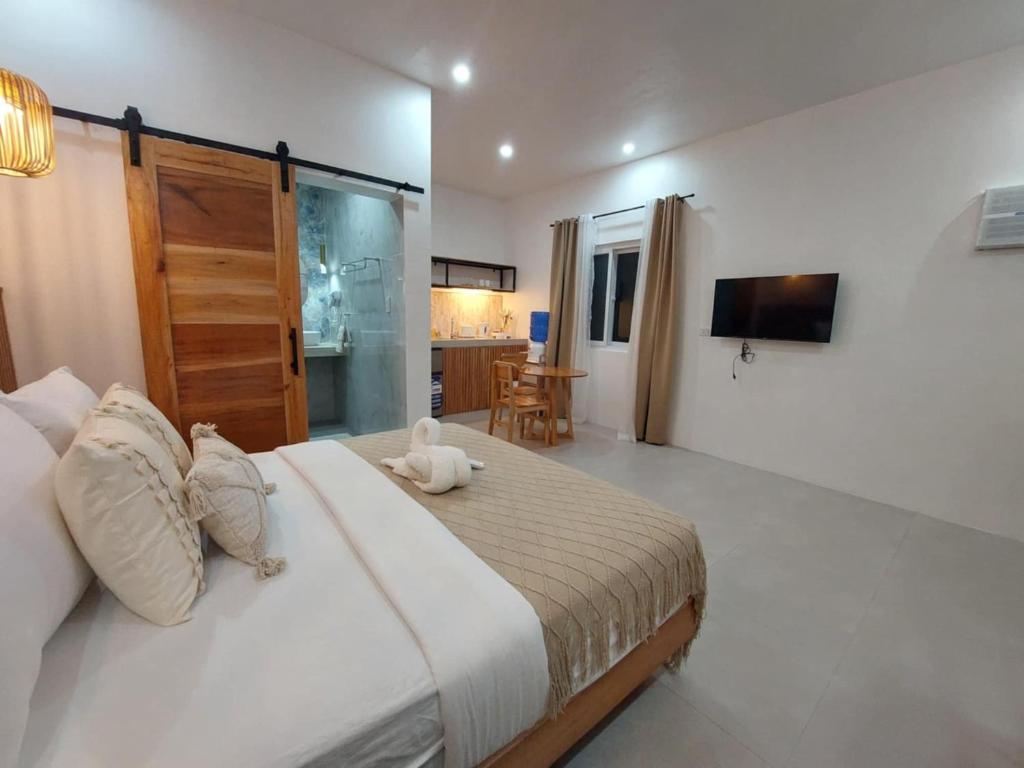 Postel nebo postele na pokoji v ubytování Villa Alessandra Homestay