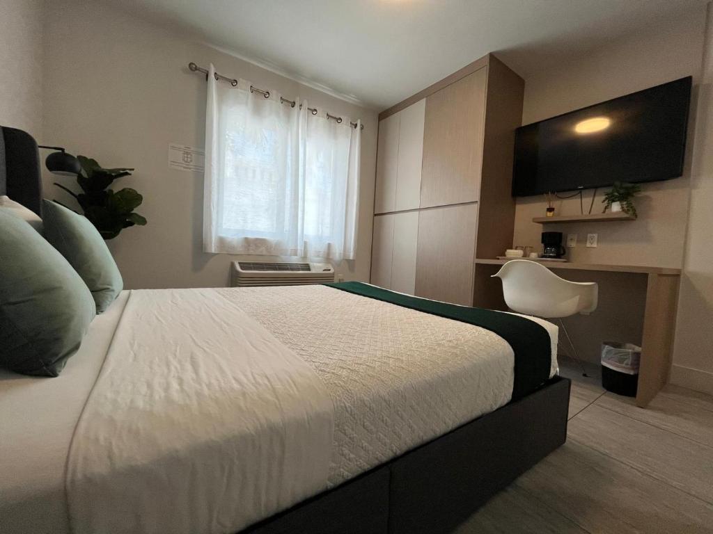 Postel nebo postele na pokoji v ubytování Costa Norte Boutique Hotel