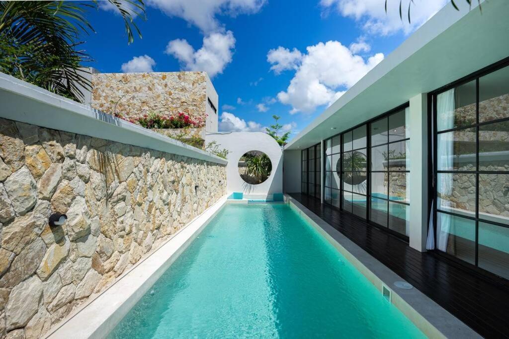 Swimmingpoolen hos eller tæt på Green Jimbaran Bay Villa III