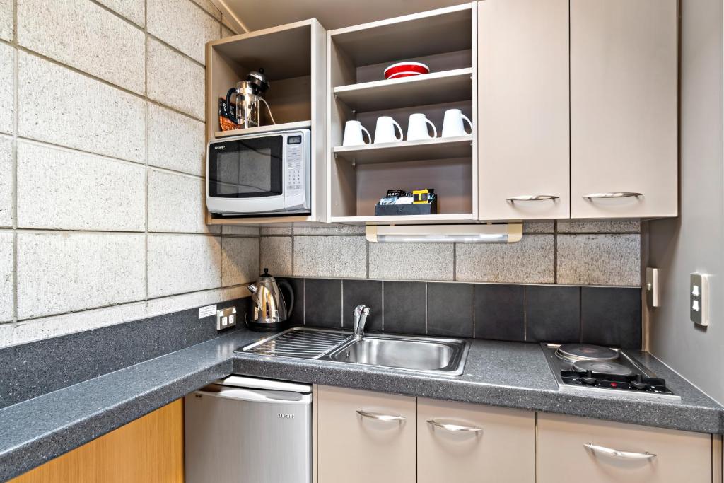 Kuchyň nebo kuchyňský kout v ubytování Kaiapoi on Williams Motel