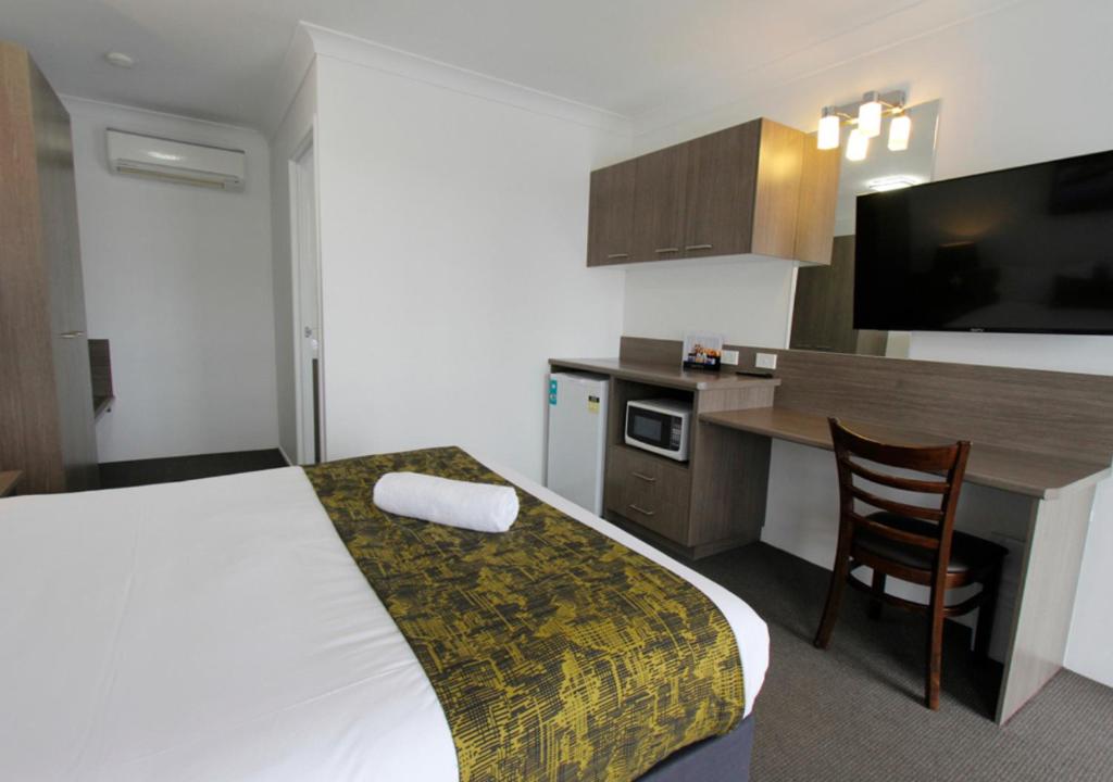 Postel nebo postele na pokoji v ubytování Takalvan Motel