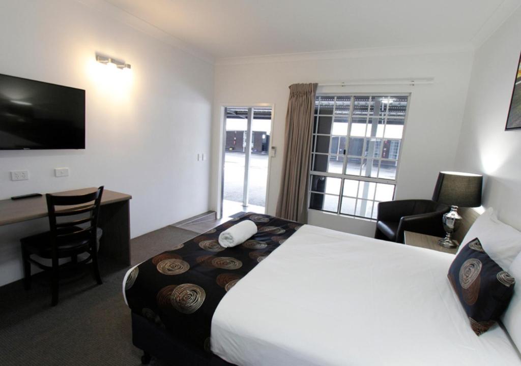 Postel nebo postele na pokoji v ubytování Takalvan Motel