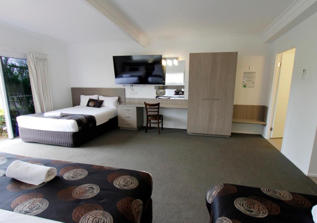 Postel nebo postele na pokoji v ubytování Takalvan Motel