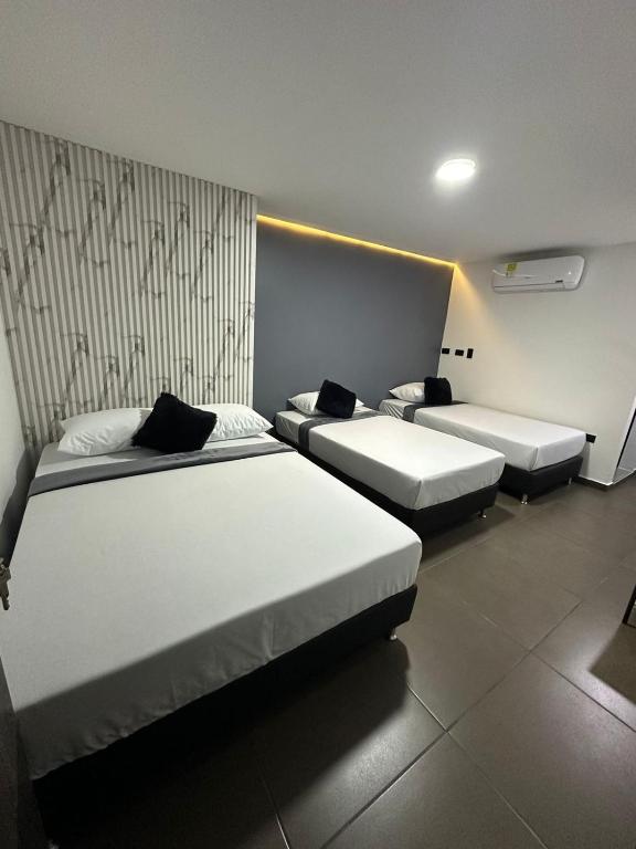 Postel nebo postele na pokoji v ubytování Hotel LAX78