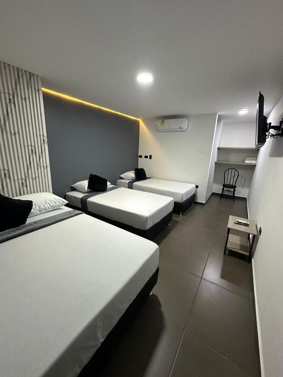 Postel nebo postele na pokoji v ubytování Hotel LAX78