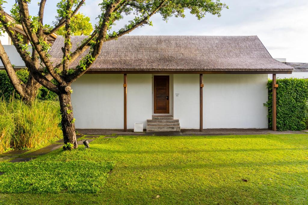 Zahrada ubytování Putahracsa Hua Hin