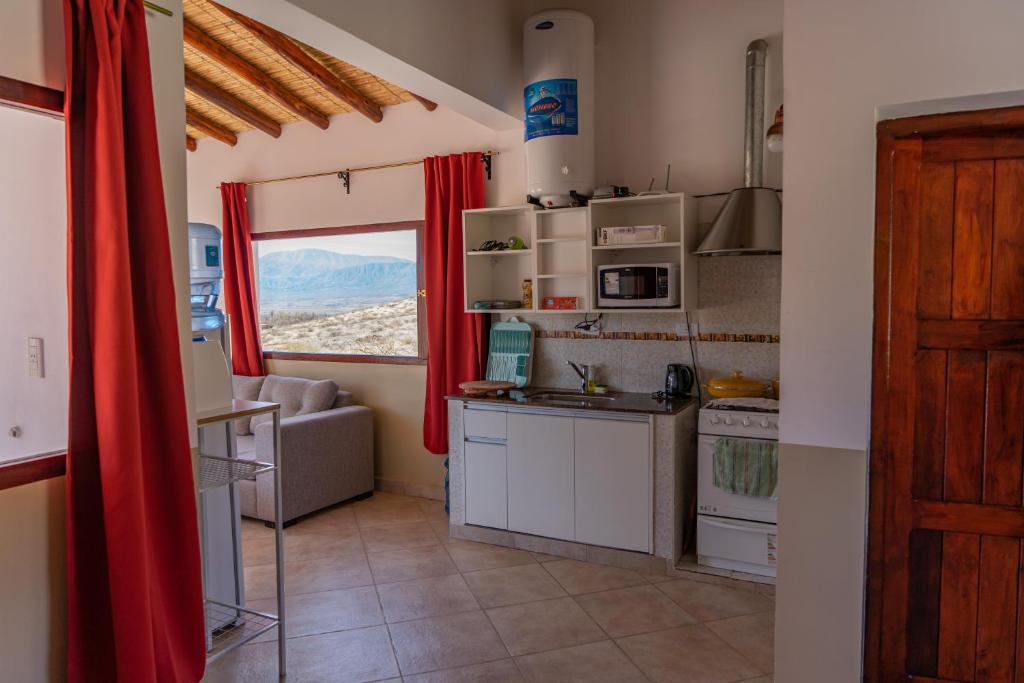 Kuchyň nebo kuchyňský kout v ubytování Puertas del Cielo II