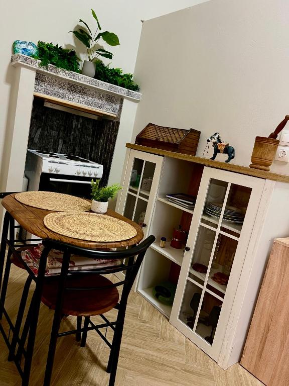 Kuchyň nebo kuchyňský kout v ubytování Niki Cottage
