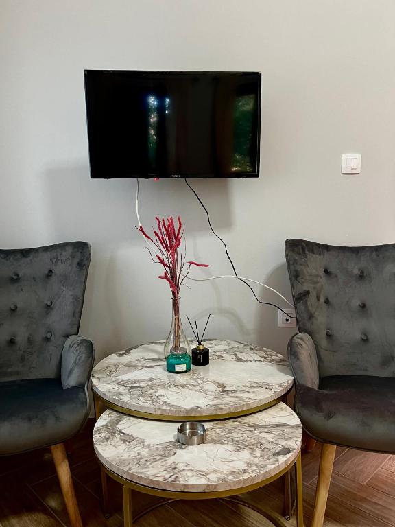 TV a/nebo společenská místnost v ubytování Niki Cottage