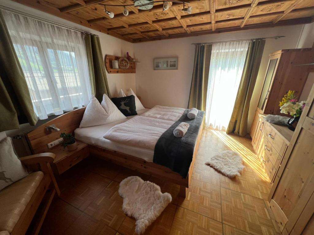 Postel nebo postele na pokoji v ubytování Oberbründlingchalet