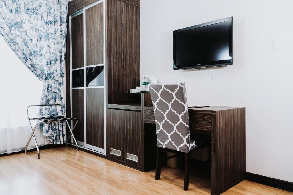 TV a/nebo společenská místnost v ubytování Hotel Nur Miri