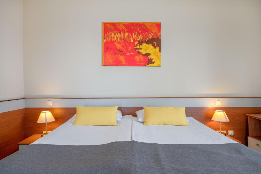 Posteľ alebo postele v izbe v ubytovaní Hotel Punta