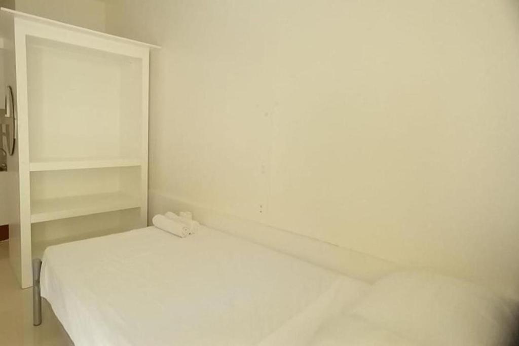 Postel nebo postele na pokoji v ubytování Palajuanders Inn Palawan