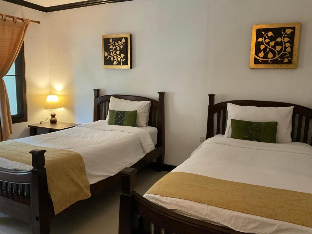 Postel nebo postele na pokoji v ubytování Seashell Resort Koh Tao-SHA Plus