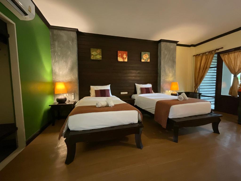 Postel nebo postele na pokoji v ubytování Seashell Resort Koh Tao-SHA Plus