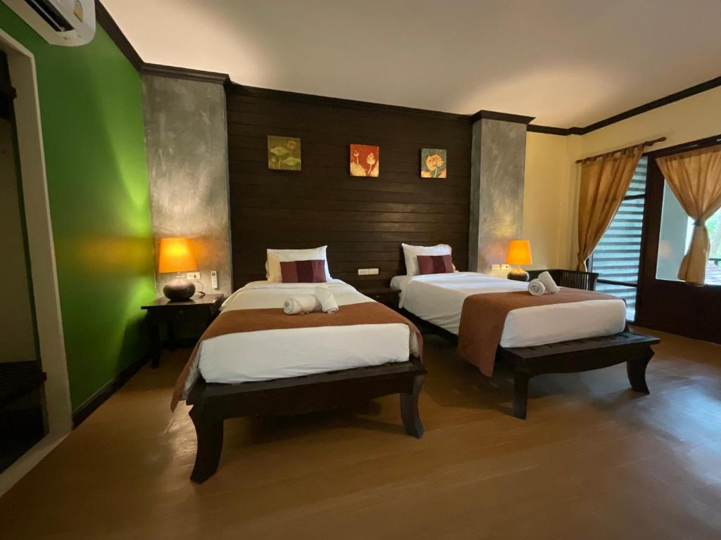 Postel nebo postele na pokoji v ubytování Seashell Resort Koh Tao-SHA Plus
