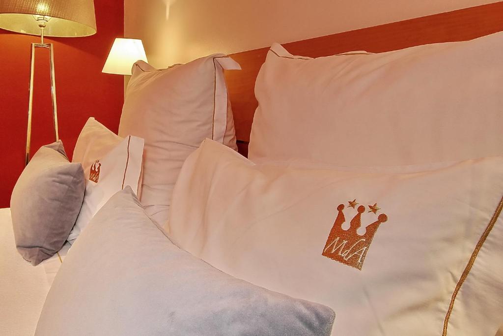 Postel nebo postele na pokoji v ubytování Hotel Mestre de Avis