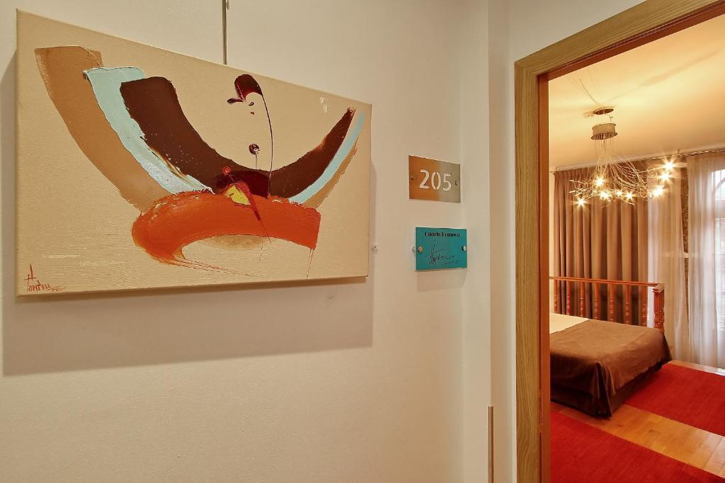 Postel nebo postele na pokoji v ubytování Hotel Mestre de Avis