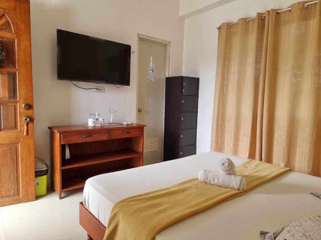 Postel nebo postele na pokoji v ubytování Bridgeview Residences