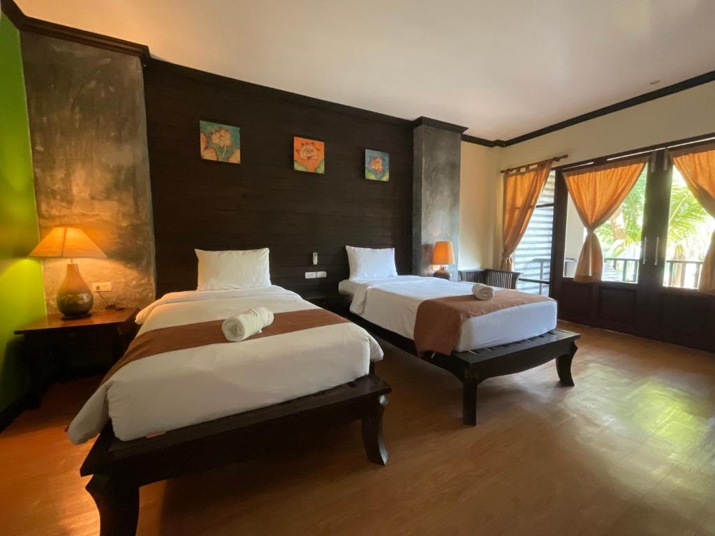Postel nebo postele na pokoji v ubytování Seashell Resort Koh Tao-SHA Plus